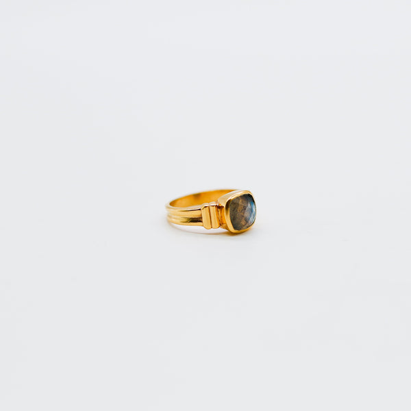 Gold ring with grey stone 